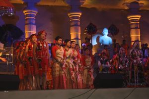 COLOURFUL TREAT: Against a sandstone mahal, a show of India's dances by a 500- strong troupe.