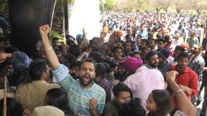 RALLY: Students of Punjab University protesting against action taken by the authorities against the topper who turned out to be 40 years old and was writing the exam for some other stud
