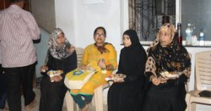 GATHERING: The women enjoying their snacks of dates, fruit, a savoury…before praying, listening to various talks from the Quran, and after dinner retiring to their homes to catch up with sleep (of which there is precious little during the month of Ramzan)